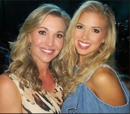   Gracie Hunt, Tavia Grilletes' daughter with Clark Hunt won the 2021 Miss Kansas crown. 