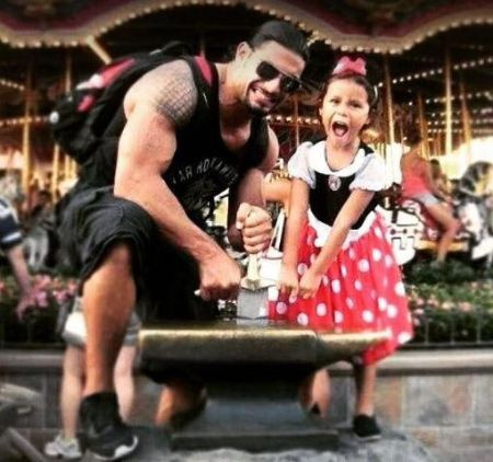   Alegar'i family member, Roman Reigns with his eldest daughter, Joelle Anoa'i.